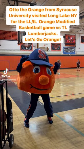 Otto the Orange, Syracuse University’s mascot took to the Long Lake, NY basketball court as the Long Lake/Indian Lake Orange faced the Tupper Lake Lumberjacks. #mascot #syracuse #orange #longlakeny #indianlakeny #longlakecentralschool @theottoorange | Long Lake