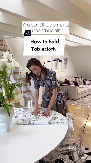Effortless Tablecloth Folding Hack for Home Organization