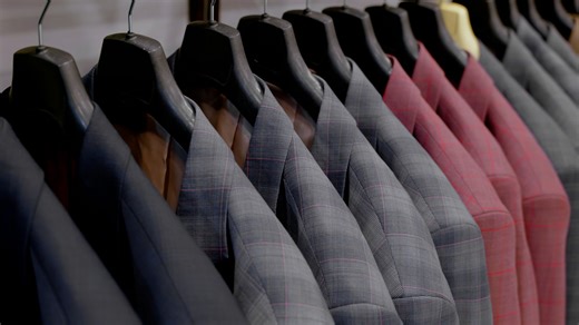 collection-of-fashionable-men-s-suits-displayed-el-2025-12-08-20-31-59-utc