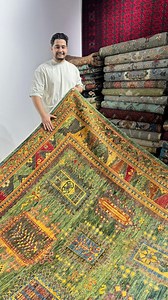 A Masterpiece of Afghan Craft – Where Tradition Meets Art This stunning 3 x 4.2 m (10 x 14 ft) handmade Afghan carpet showcases vibrant tribal motifs, rich earthy tones, and centuries-old weaving heritage. Every pattern is knotted by hand using natural dyes and hand-spun wool, giving it depth, character, and timeless authenticity. Price: 14,800 AED ✔️ Free worldwide delivery A rare statement piece that elevates any room into a place of warmth, culture, and luxury. | Artwoolcarpet
