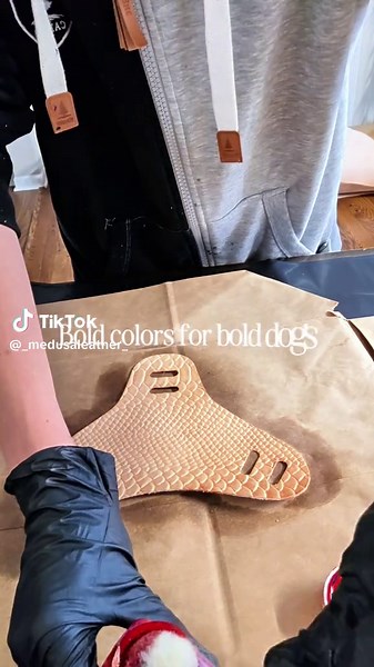 Hand dyeing 3 chest pieces for custom leather dog harnesses 🐾🔥 Red snakeskin (adult), oxblood & moss green (puppy)! In the works of new puppy working harnesses! #LeatherCraft #DogHarness #HandmadeLeather #WorkingDogGear #Leatherwork