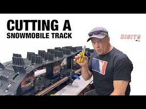 Cutting and clipping a snowmobile track.