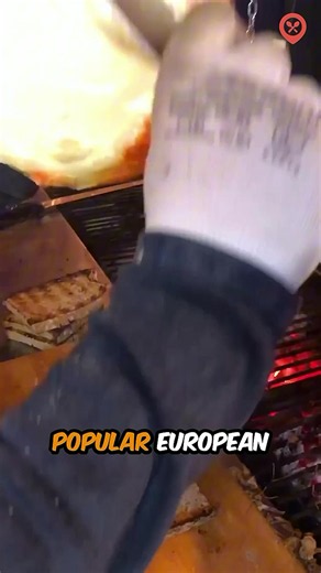 Have you ever heard of Raclette? 🧀 This Swiss dish is made by melting a wheel of raclette cheese and scraping the gooey, melted layer over potatoes, pickles, and other accompaniments. It comes from the Swiss Alps, where herders traditionally melted cheese by the fire before scraping it onto bread or potatoes. Would you try it? #streetfood #cheese #cooking #food