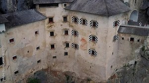Predjama Castle, renaissance castle built within a cave mouth, Aerial