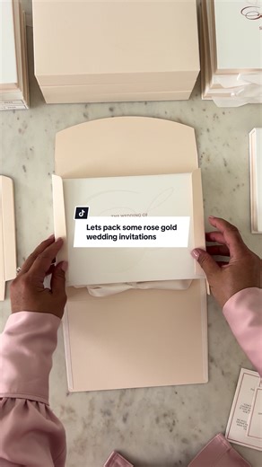 Packing our clients Sarah & Peter’s wedding invitations. They chose rose gold (yay!) it’s not often we see couples opting for rose gold, here’s hoping it’s a trend that catches on for 2026. Yes, these are boxed wedding invitations that will be hand delivered or mailed out to guests. Yes, we can customise these boxes to your wedding colours. And yes we ship internationally ✈️ DM or visit our website for more information on how we can create some beautiful wedding invitations for your wedding day.