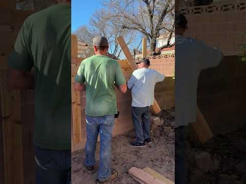 Easy DIY block wall privacy extension out of wood