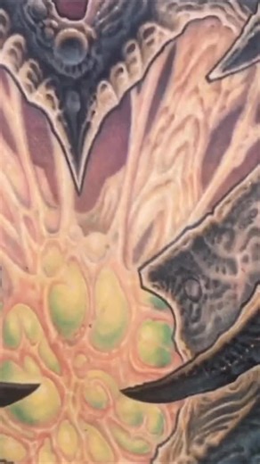 Exploring the Intricate Biomechanical Tattoos by Guy Aitchison