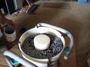 Tumbling rusty bolts in a Gyroc Vibratory Tumbler (Model A)