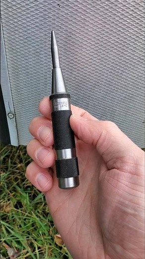 Starrett 18C Automatic Center Punch on metal, USA tool