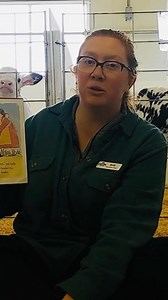 Brittany is in the calf barn reading “Kiss the Cow” written by Phyllis Root and illustrated by Will Hillenbrand. Join us each Monday and Thursday for Virtual Story Time. | Pineland Farms