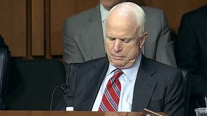 McCain shows off his poker face