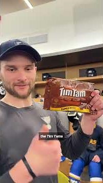 Nathan Walker introduces teammates to Tim Tams