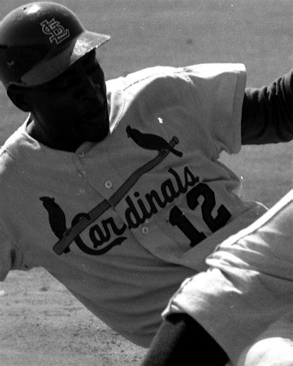 A power-hitting first baseman and Gold Glove defender, Bill White was part of a core of Black All-Stars who helped the Cardinals capture the 1964 World Series title. After his retirement, White became the first Black play-by-play broadcaster in MLB history when he joined the Yankees broadcast team in 1971, and later served as President of the National League. He was inducted into the Cardinals Hall of Fame in 2020. | St. Louis Cardinals