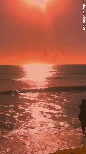 Demi Rose shows off curves in bikini on Brazil beach as she watches the sunset