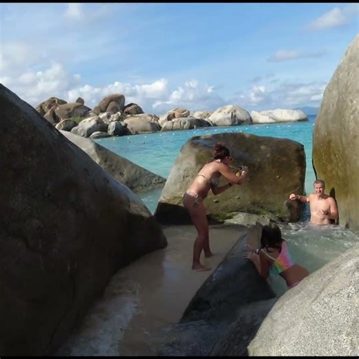 British Virgin Islands beach with large round stones.