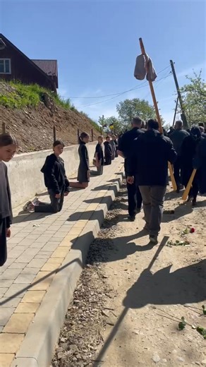 5.5K views · 185 reactions | This video shows a funeral procession held for a fallen Ukrainian soldier in the mountain village of Richka, Ivano-Frankivsk Oblast, on May 3. Since the beginning of Russia’s full-scale invasion of Ukraine, local residents often kneel right on the street during such processions out of respect for the fellow citizens who have sacrificed their lives to defend their country. Video: Maria Vasylchuk | The Kyiv Independent | Facebook