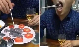 Sick: Video Emerges Of Chinese Man Eating Live Baby Mice!