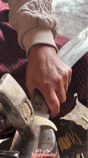 Installing Copper Nails on Handle