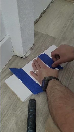 Installing baseboard like a pro CA Glue for the win #diy #carpentry #shorts