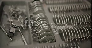 Closeup of trial frame for test vision in ophthalmologist cabinet. Professional tool for examination of client eyesight