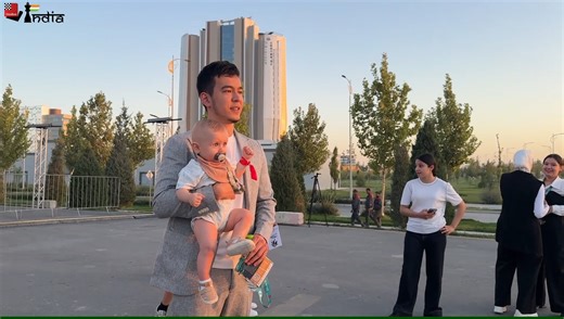 9.1K views · 101 reactions | The local star Nodirbek Abdusattorov holding up a baby as fans take his photos after his draw in the 6th round of FIDE Grand Swiss! Video: Aditya Sur Roy #chess #chessbaseindia #NodirbekAbdusattorov #fidegrandswiss | ChessBase India | Facebook