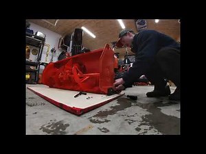 Kubota BX2816 snowblower with Poly skid shoes