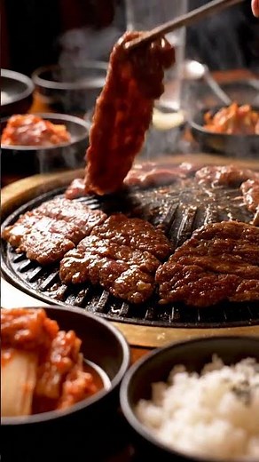 Sizzling Korean Barbecue Feast with Marinated Beef, Kimchi, and Traditional Side Dishes