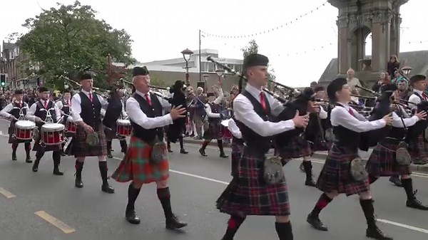 The street parade as pipe bands made their way to the 2023 Crieff Highland Gathering on Sunday 20th August 2023. The bands taking part here were Morrison's Academy Pipe Band, followed by the Shetland Vikings from Nesting and Girlsta Up Helly Aa with guizer jarl Jonny Knight. After them is Doune Pipe Band and at the back is The Vale of Atholl Pipe Band. There were six bands taking part in the Gathering, each having marched through Crieff to the Games, leading the crowds through the town to the Ga