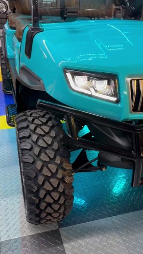 Our featured golf cart this week is this fully custom 2024 Sky Blue D5 Maverick! This cart was so popular that it sold right after we put it out on the showroom floor, and we had immediate requests for more to be made! It’s definitely one of our favorite things when someone comes in to look around, sees one of our custom carts, and immediately exclaims, “that’s the one!”. This golf cart is a true BEAUTY! The contrast between the brown premium leather hand-stitched seats, the flawless eye-catchin
