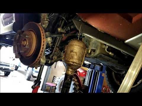 19.- HOW TO REMOVE AND INSTALL FRONT STRUT 2006-2010 JEEP COMMANDER