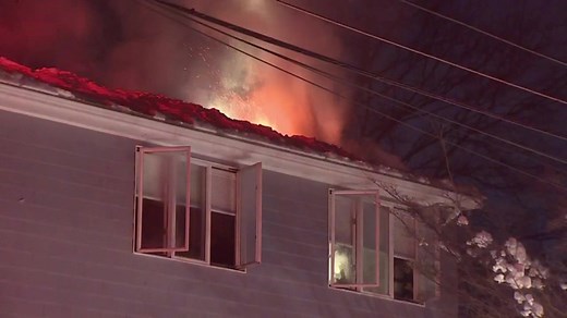 Crews battle house fire in Stoneham
