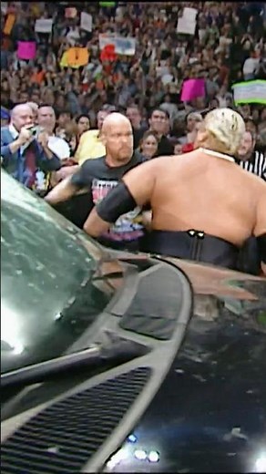 Stone Cold DRIVES up to take on Rikishi!
