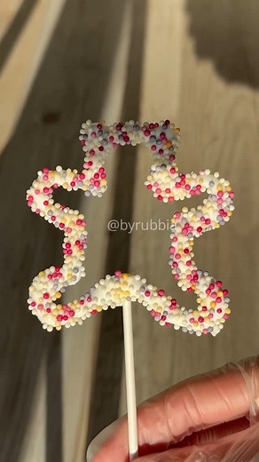 Rubbia | Turned royal icing into cute little cake toppers using stencils + sprinkles magic ✨Who knew decorating could be this satisfying? #fyp... | Instagram