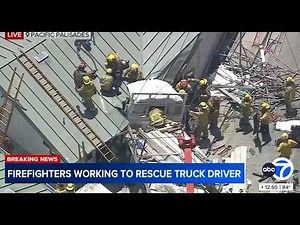Rescue operation underway after truck slams into building on PCH
