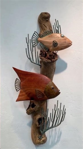 Creating a tropical coral reef with a trigger fish made of bronze and liquidamber wood