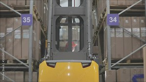Workflow in a large warehouse. Modern equipment in a factory warehouse