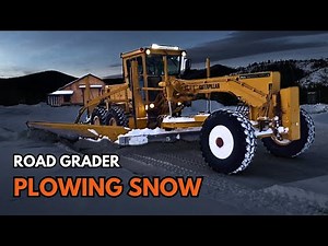 SNOW PLOWING WITH CAT ROAD GRADER!!!