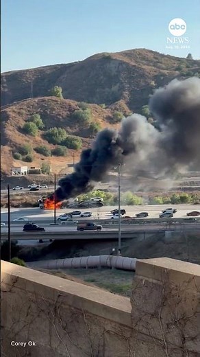 Smoke billows after semi-truck carrying Teslas catches fire