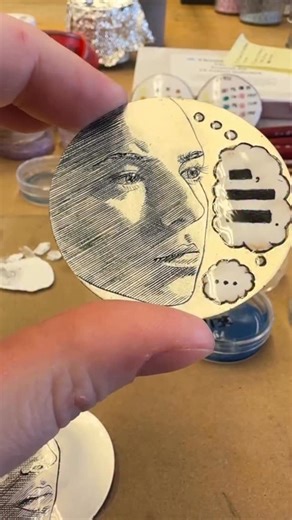 Penland School of Craft on Instagram: "This beautiful pair of engraved and enameled self-portraits by May Paradise @maybewelding explores the artist’s relationship with grief. May came to Penland’s winter residency with the goal of exploring ways to incorporate enameling techniques into her engraving practice, and we’re impressed with her efforts! We asked May to tell us about the PROCESS of creating this work and here’s what she had to say: ➡️ “First I hand engraved the mirrored faces onto 2” f