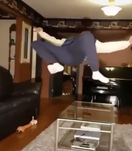 Guy breaks glass table