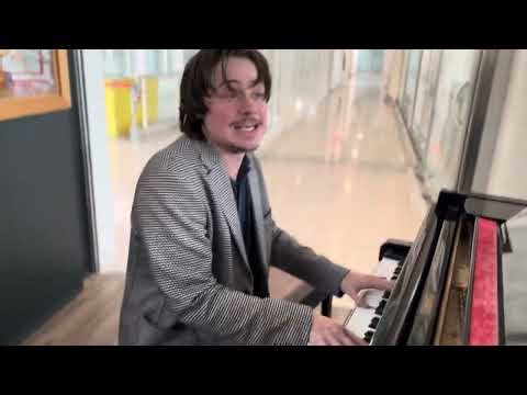 When a Guitarist finds a Piano at the Airport