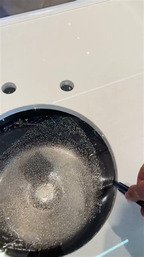 Stoves countertop with quartz stone film, kitchen renovation.