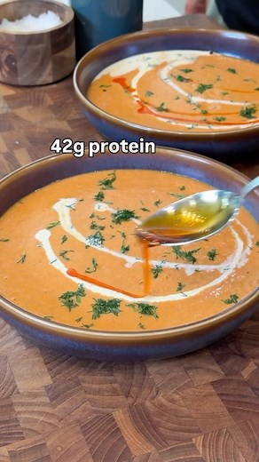 Bobby Parrish on Instagram: "EASY Creamy High-Protein Tomato Soup 🥫🥣 42g protein in the entire recipe (makes 2 servings) Ingredients: 2 pounds tomatoes 1 large onion, quartered 5 cloves garlic 3/4 teaspoon dried thyme 1 1/4 cup cottage cheese 8-10 ounces chicken bone broth 1 teaspoon honey 1/2 teaspoon red pepper flakes(optional) Extra virgin olive oil Chili Oil Fresh dill Salt & pepper Directions: Preheat oven to 400 degrees convection, or 425 bake. Halve the tomatoes and place in a roasting 