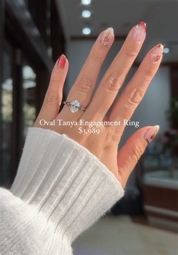 The Tanya engagement ring features a stunning split shank and a low profile that sits flush to the finger. A split shank is a band that divides into two or more separate strands as it reaches the center stone, creating an architectural and romantic look 🥰 💍 2.05ct D-VS1 Oval Lab Diamond Tanya Engagement Ring $3,989 How To Order ✨ 💬 Text/Call: 714.899.1122 🛍️ Shop now at PrincessBrideDiamonds.com 📆 Book an appointment to visit IRL: https://princessbridediamonds.com/pages/make-an-appointment