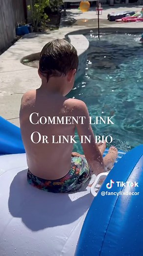 Easy inflatable water slide! Just fill the bottom woth water for weights. My kids are 5 and almost 8 and loved this! #poolslide #poolmusthave