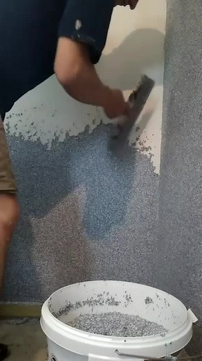 Applying Textured Coating for Modern Walls