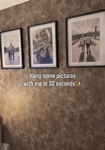 Hang some pictures with me 😮‍💨✨ Please don’t come at me for how I hang my pictures😅 it works for me, they’re always straight and even and have never fallen off the wall (yet)😂 I’m using command strips to hang the frames up, that way I’m not causing any damage to the wall👌🏼 and yes, the worlds smallest level is all I could find.. it’s done the job though haha 😅 #homedecor #pictures #family #masterbedroom #diy