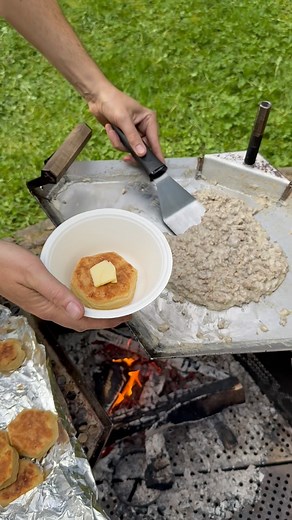 Camp-made biscuits and gravy from scratch. 🤤 These biscuits turned out perfect. Of course they have to be hexagon, which helped with dough scrap. 100/10 We will be making this again. Live fire cooking made easy. 🔥 #biscuitsandgravy #campfood #livefirecooking #portablegriddle | Dirt Road Tools