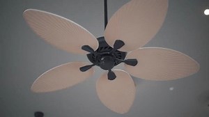 Rotation of ceiling fan blades. Smooth fan movement. Cutaway for video editing.