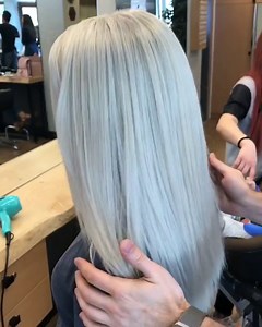Flawless blonde hair transformation with icy white finish
